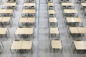 desks lined up in exam room